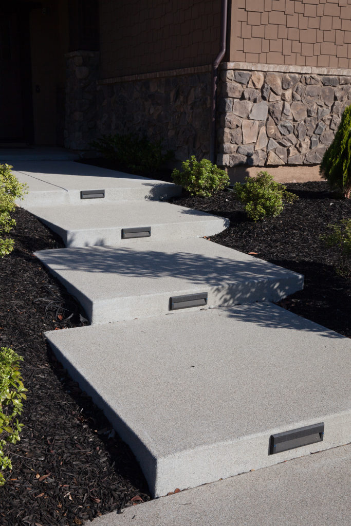 Washed concrete entry way. Built in path lights. San Marcos, Ca