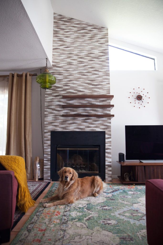 Marble Tile Mosaic. Interior fireplace. Custom walnut wood shelves.